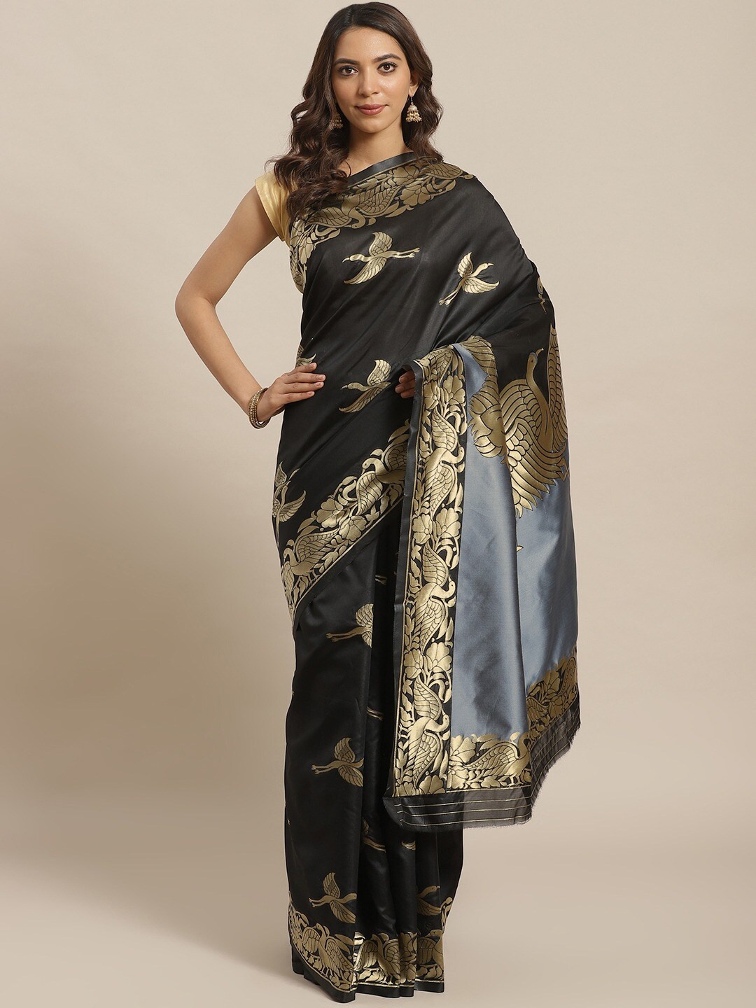 

Shaily Black & Golden Woven Design Zari Silk Blend Saree