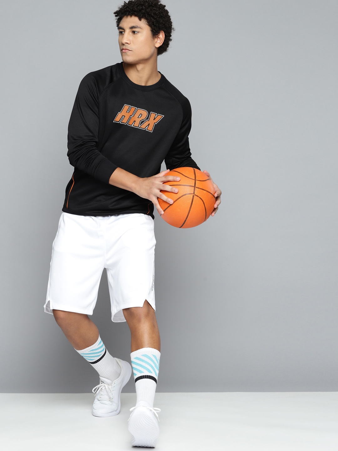 

HRX by Hrithik Roshan Men Black Brand Logo Printed Basketball Sweatshirt