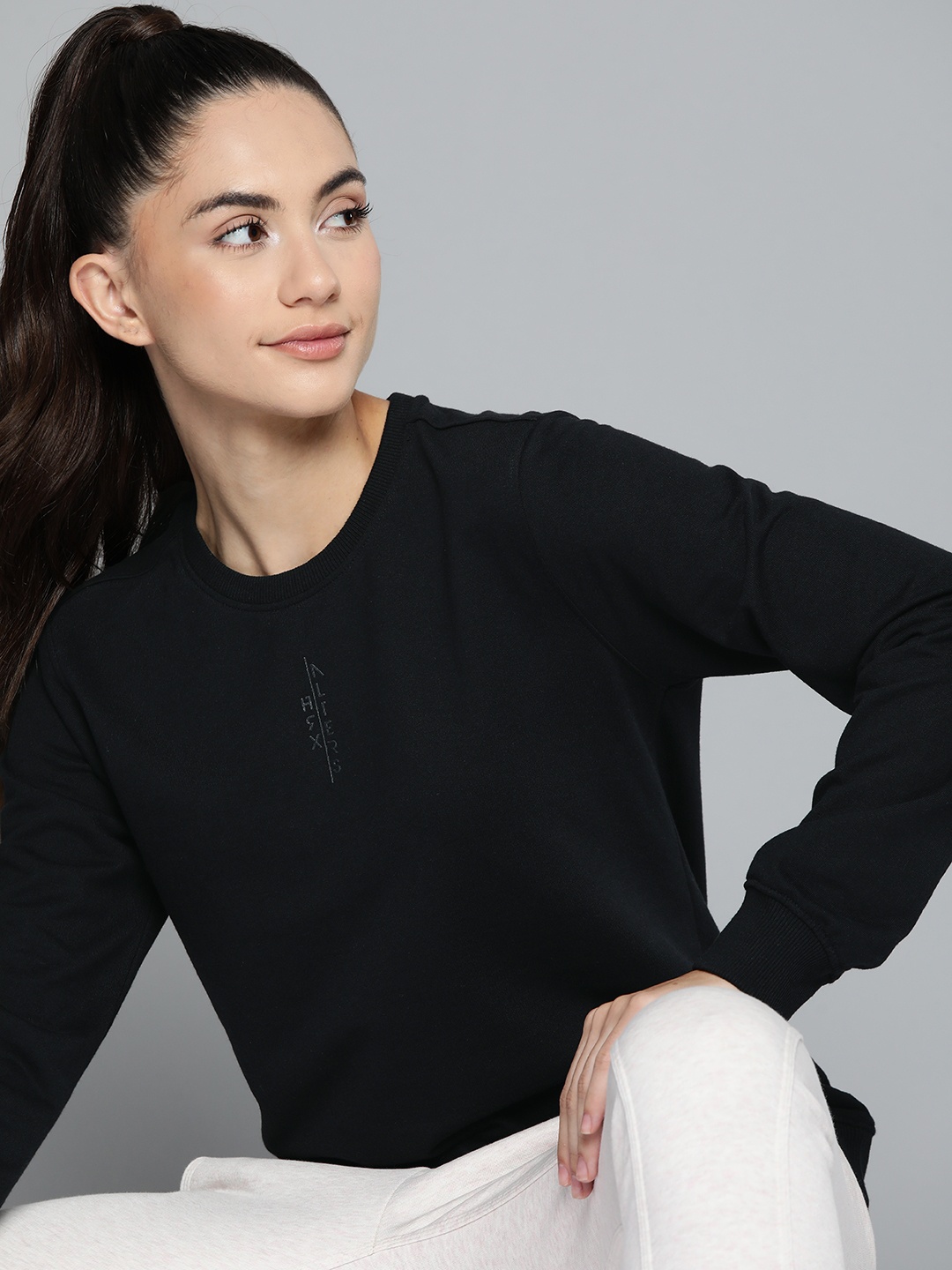 

HRX by Hrithik Roshan Women Black Sweatshirt