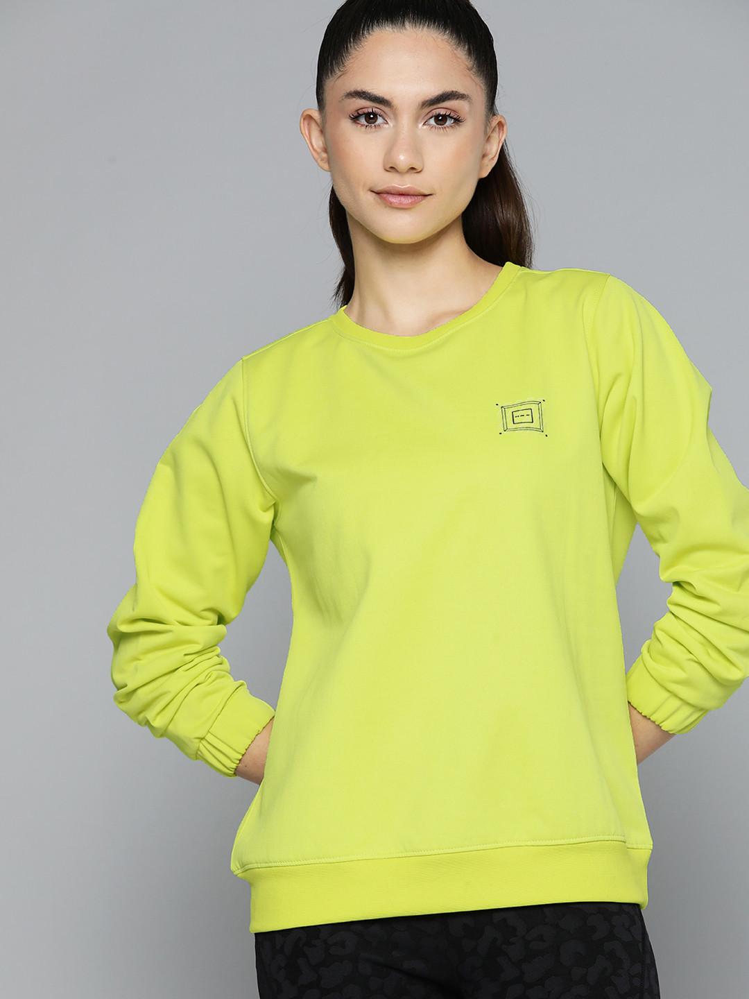 

HRX by Hrithik Roshan Women Fluorescent Green Sweatshirt