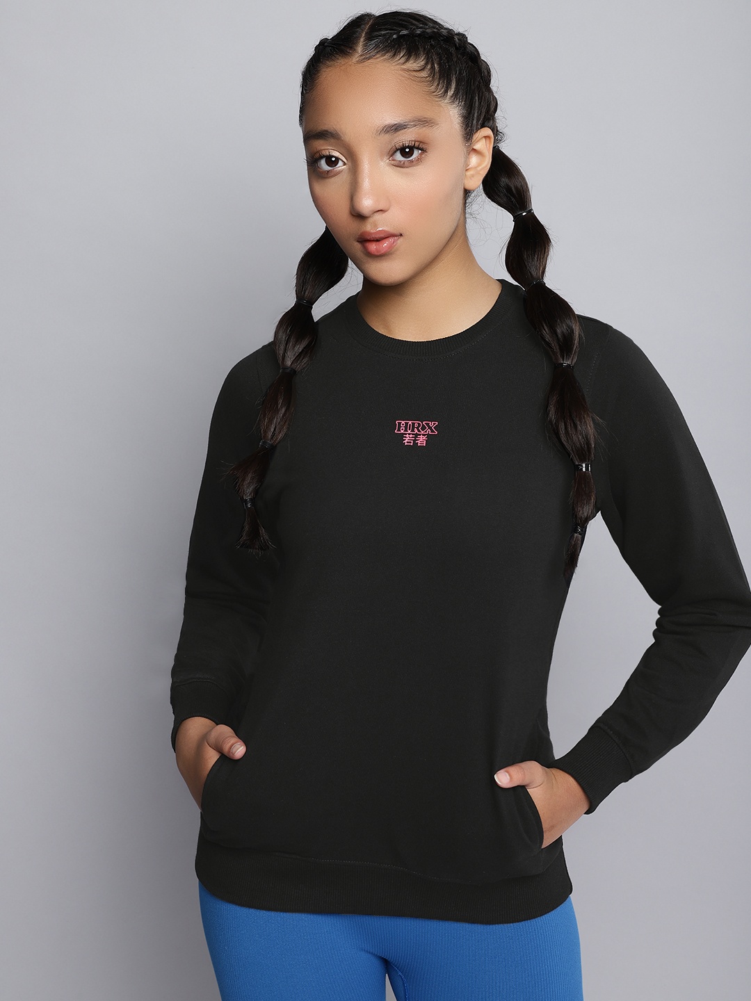 

HRX by Hrithik Roshan Girls Black Solid Sweatshirt