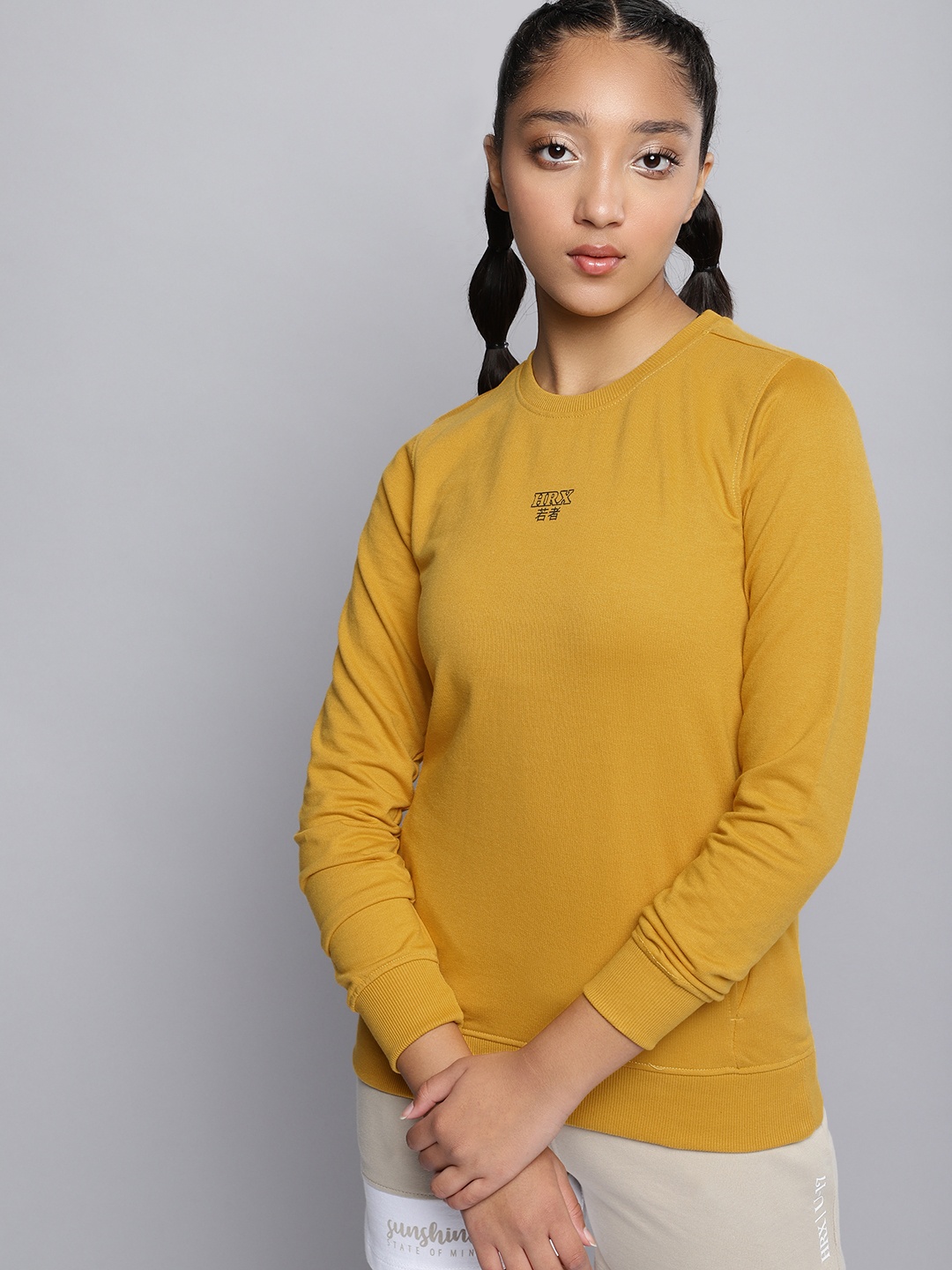 

HRX by Hrithik Roshan Girls Mustard Yellow Solid Sweatshirt
