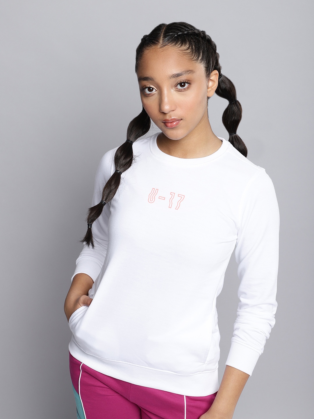 

HRX by Hrithik Roshan Girls White Solid Sweatshirt