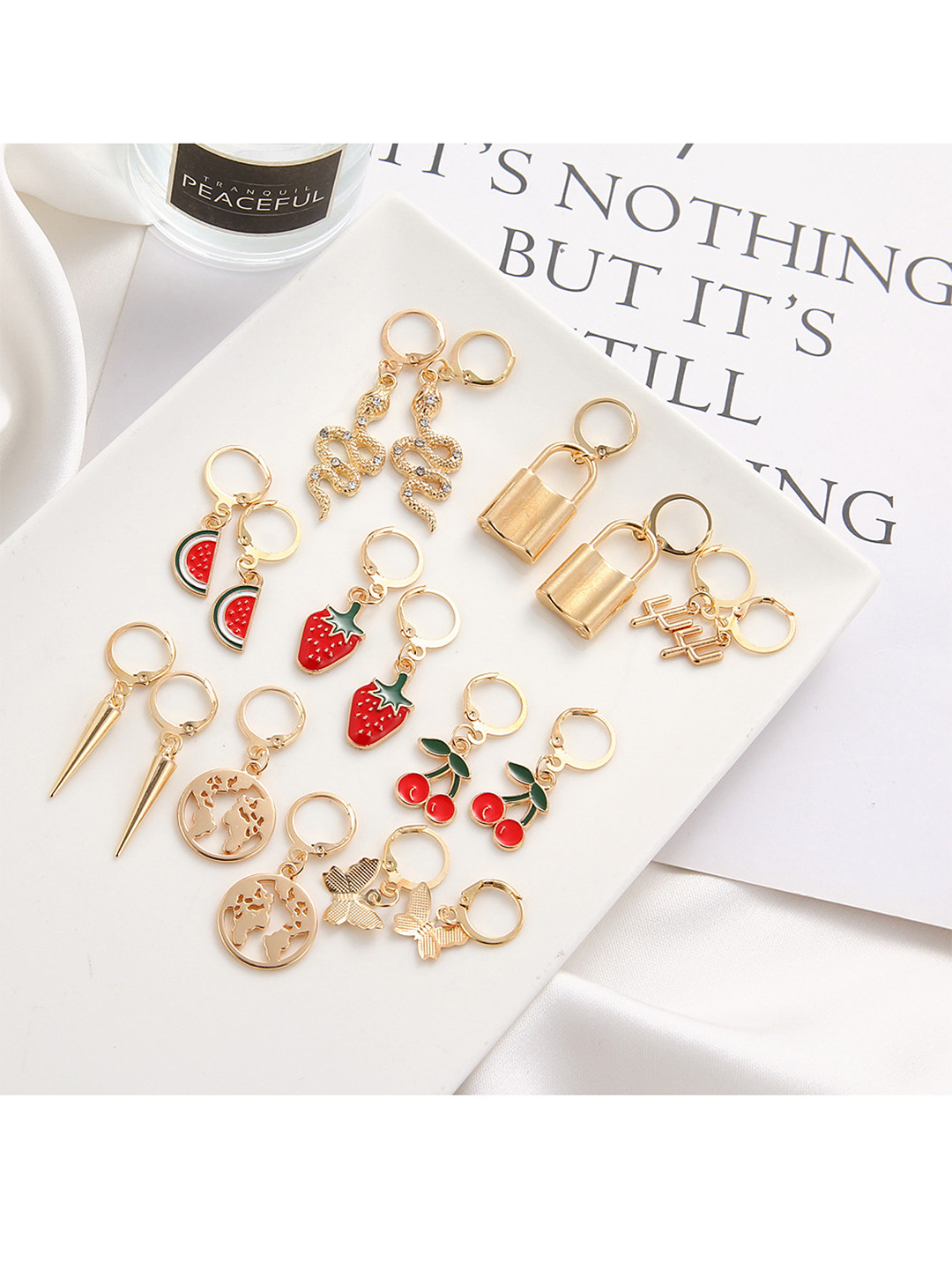 

Vembley Set of 9 Red Gold-Plated Contemporary Studs Earrings