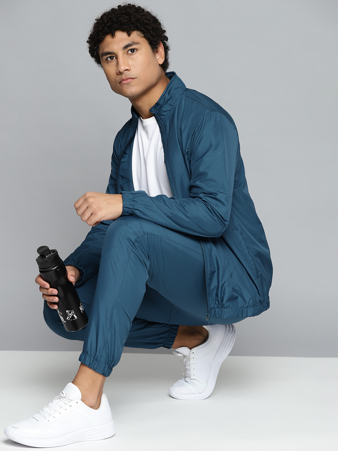 

HRX By Hrithik Roshan Men Teal Blue Running Tracksuits