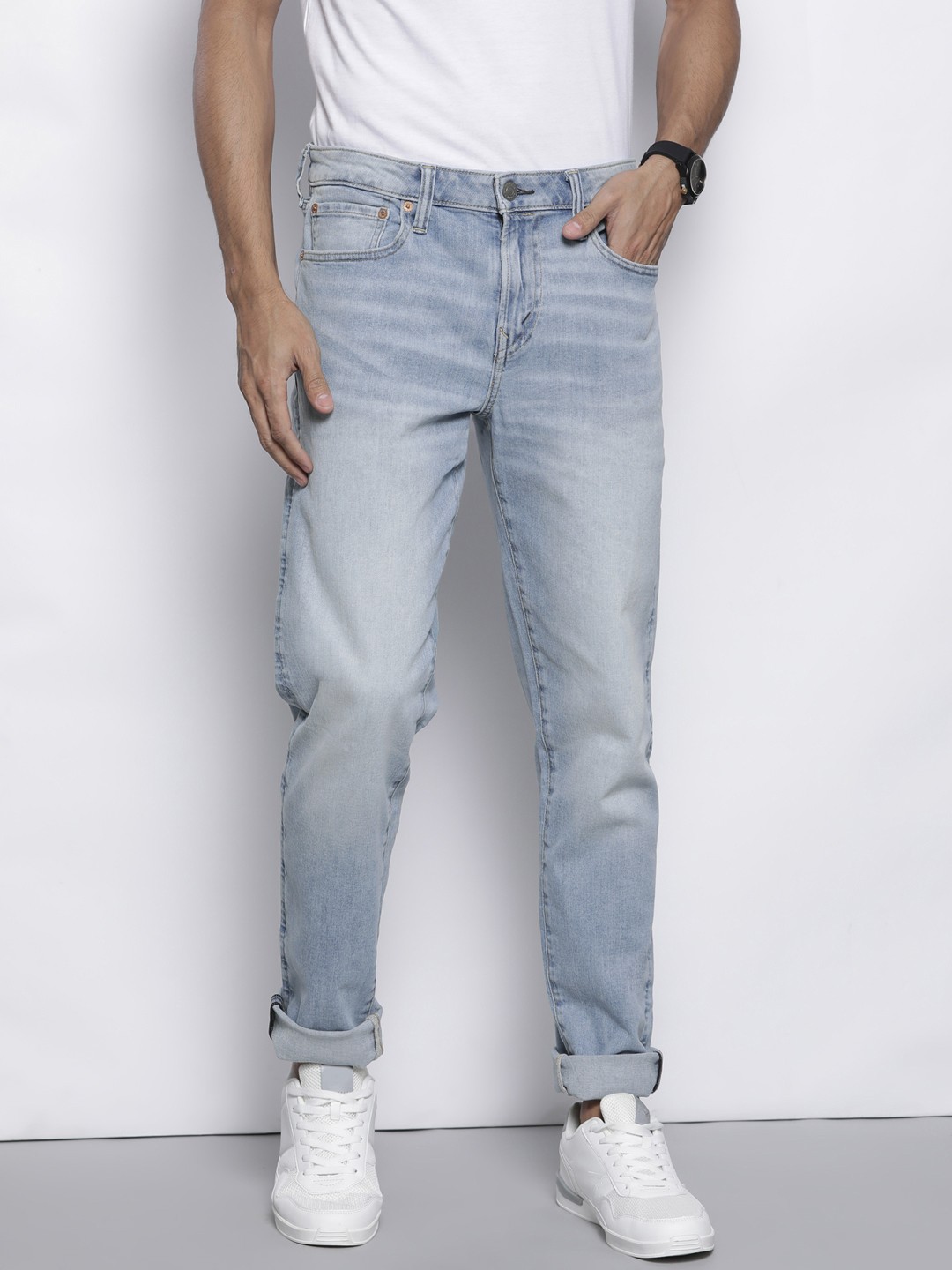 

AMERICAN EAGLE OUTFITTERS Men Blue Athletic Fit Skinny Fit Light Fade Stretchable Jeans