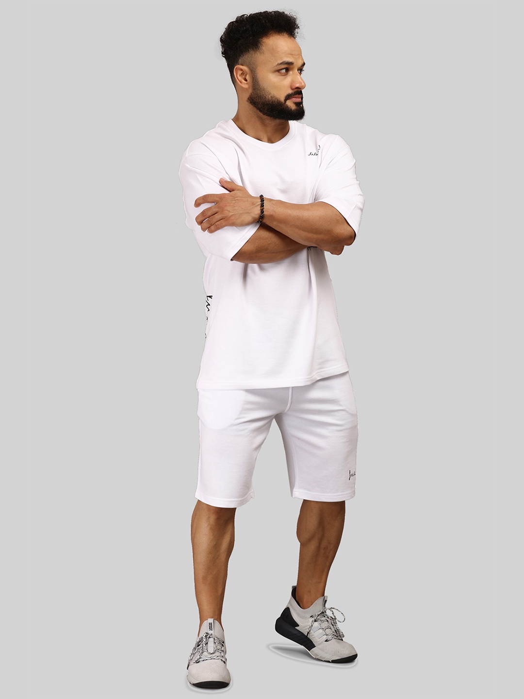 

FUAARK Men White Solid Oversize Cotton T-shirt