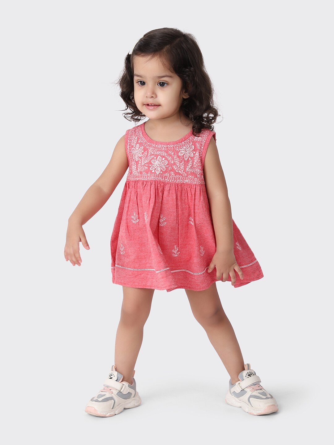 

Fabindia Girls Coral Pink Ethnic Motifs Embroidered A-Line Dress