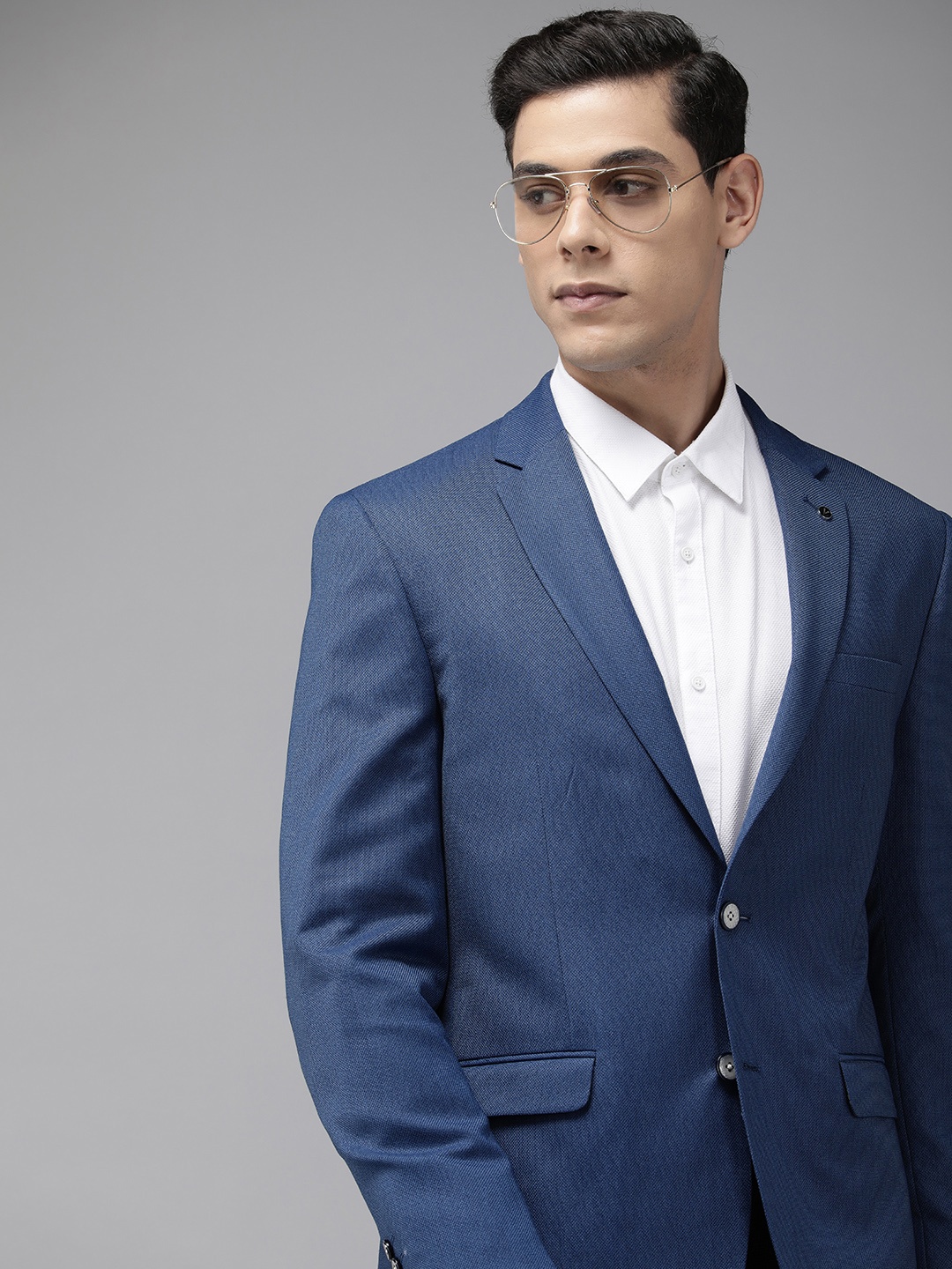 

Van Heusen Men Blue Self-Design Slim-Fit Single-Breasted Formal Blazer