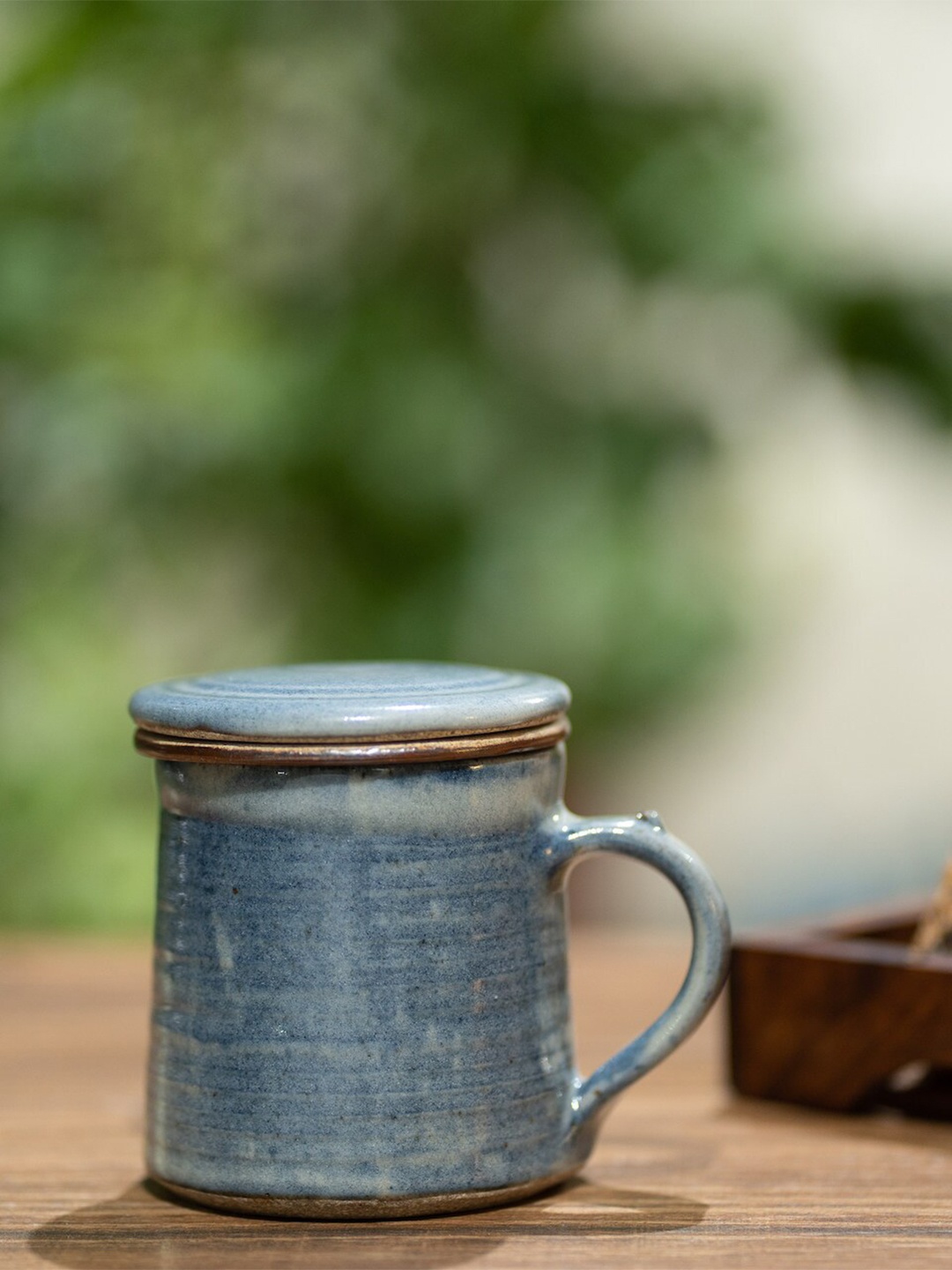 

nakshikathaa Blue & Copper-Toned Handcrafted and Hand Painted Solid Ceramic Matte Mug with Filter and Lid