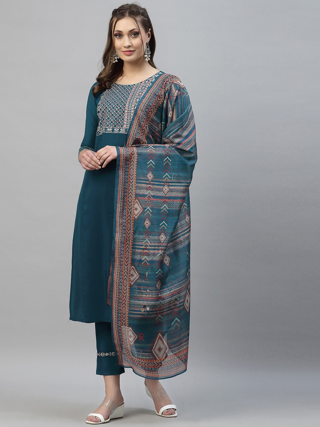 

KALINI Women Teal Ethnic Motifs Yoke Design Thread Work Kurta with Trousers & With Dupatta