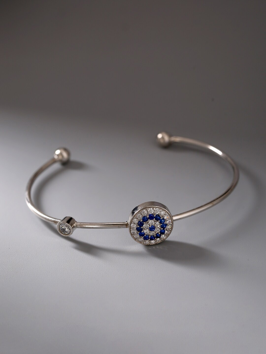 

ADORN by Nikita Ladiwala Women Silver-Toned & Blue Sterling Silver Cubic Zirconia Kada Bracelet