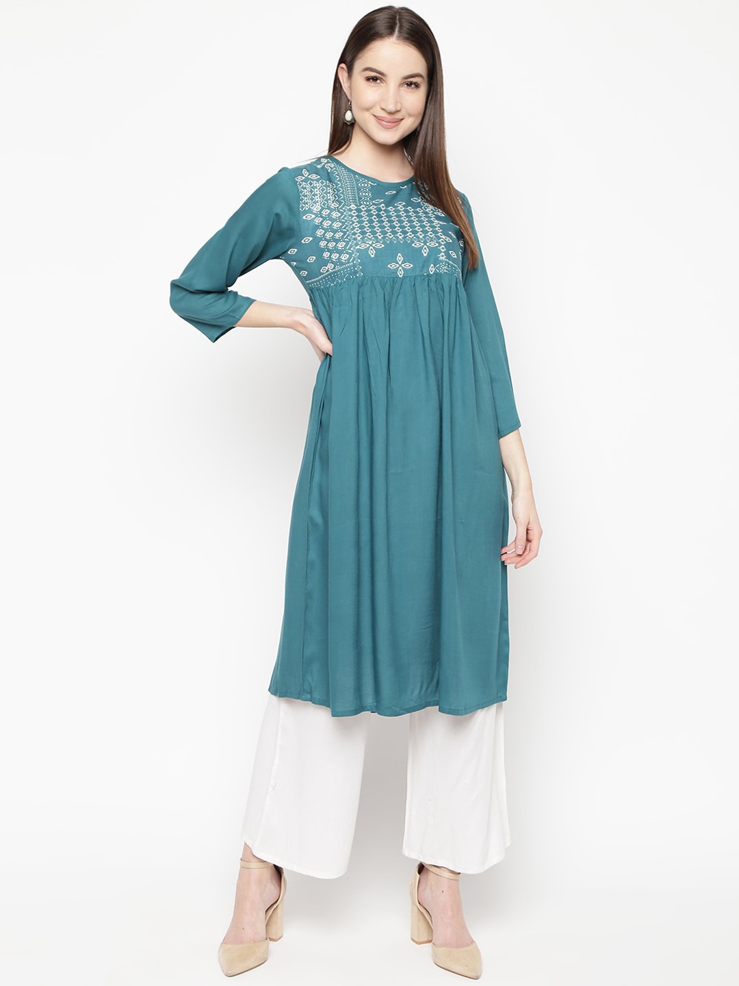 

Napra Women Sea Green Ethnic Motifs Yoke Design Thread Work Kurta