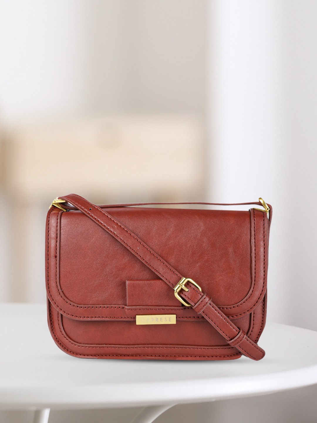 

Caprese Brown Structured Sling Bag