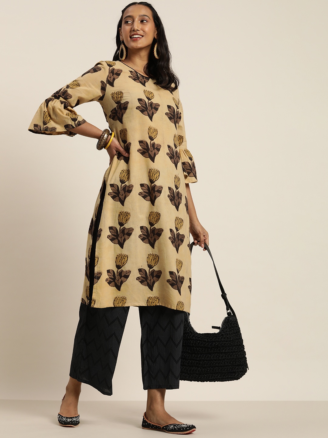 

Taavi Women Yellow & Brown Bagru Bell Sleeves Hand Block Print Kurta