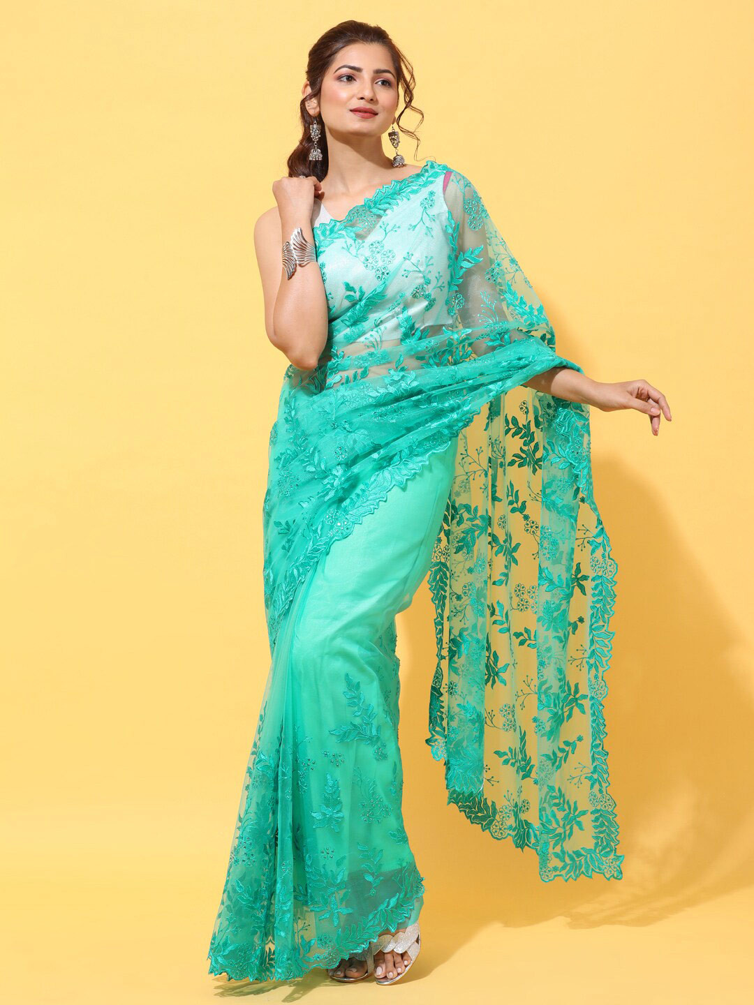 

kasee Green Floral Sequinned Net Heavy Work Saree