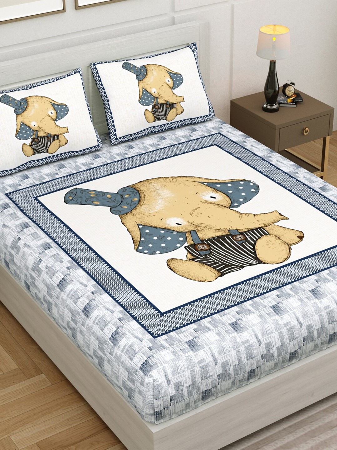 

Aura Blue & White Cartoon Characters 140 TC Queen Bedsheet with 2 Pillow Covers
