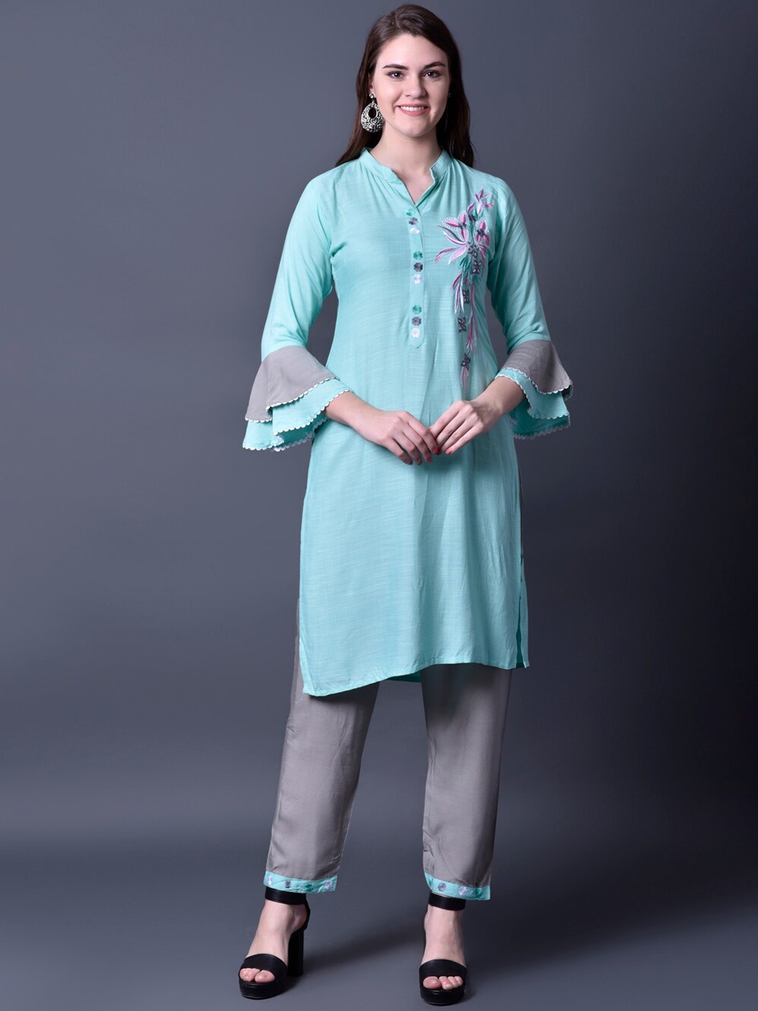 

Ziva Fashion Women Blue Floral Embroidered Kurta with Trousers