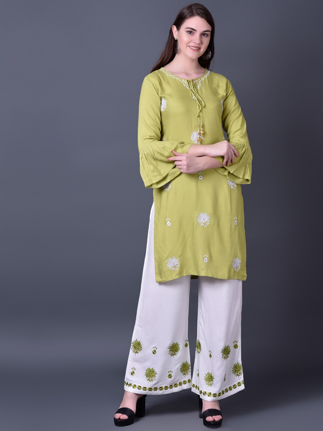 

Ziva Fashion Women Lime Green Floral Embroidered Thread Work Kurta with Palazzos