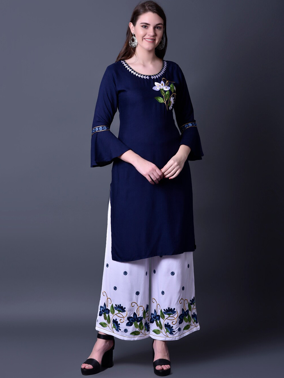 

Ziva Fashion Women Navy Blue Floral Embroidered Kurti with Palazzos