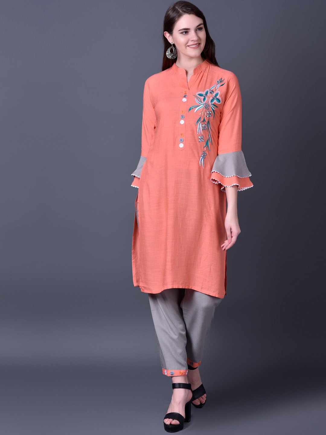 

Ziva Fashion Women Orange Floral Embroidered Kurti with Trousers