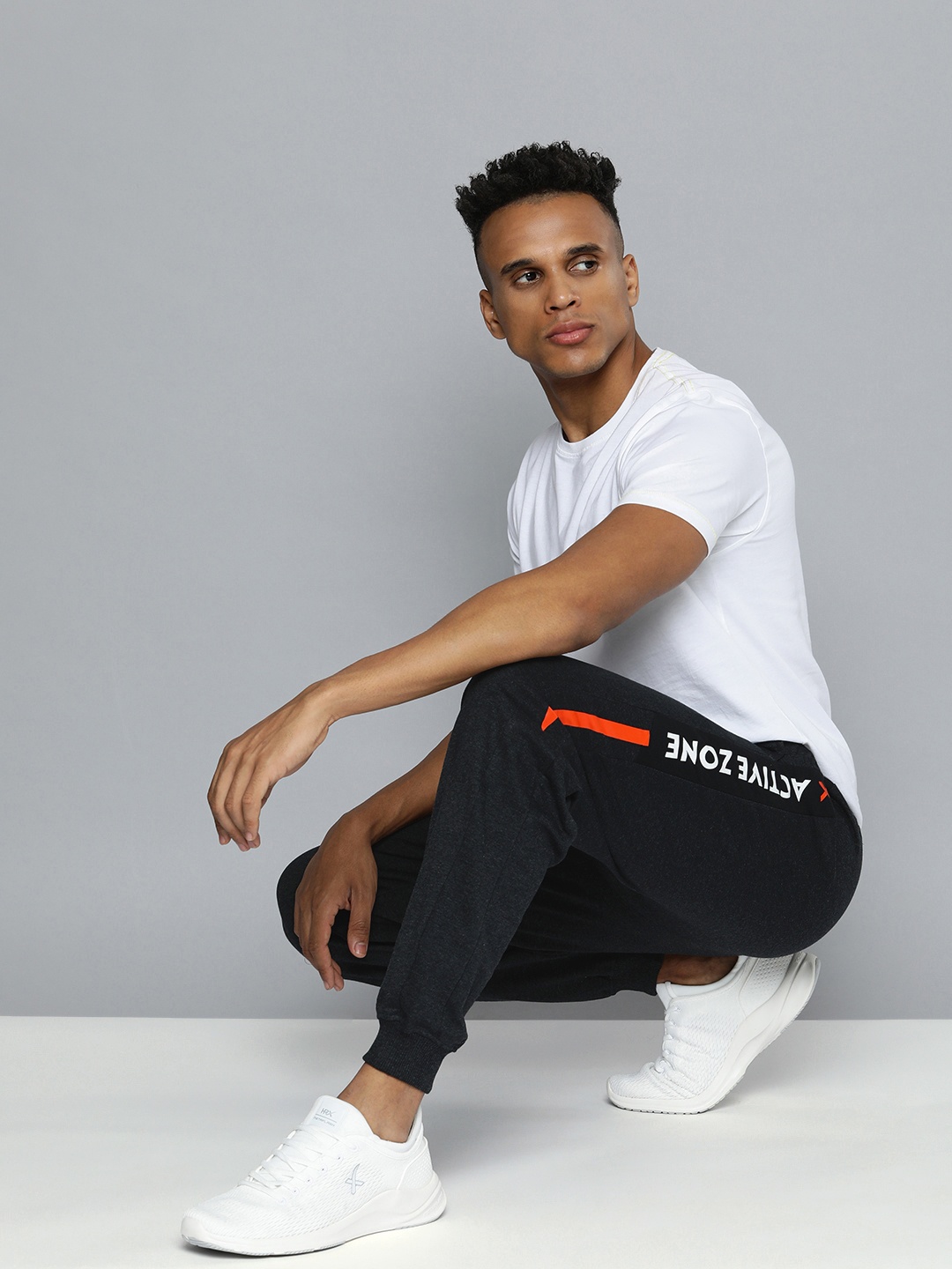 

HRX by Hrithik Roshan Men Charcoal Black Solid Joggers