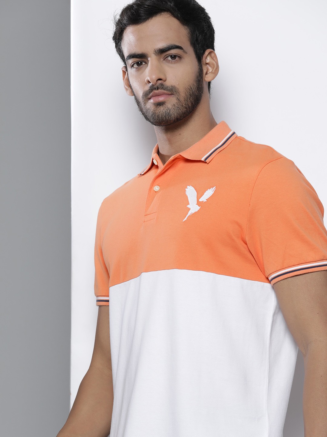 

AMERICAN EAGLE OUTFITTERS Men Orange & White Colourblocked Polo Collar T-shirt