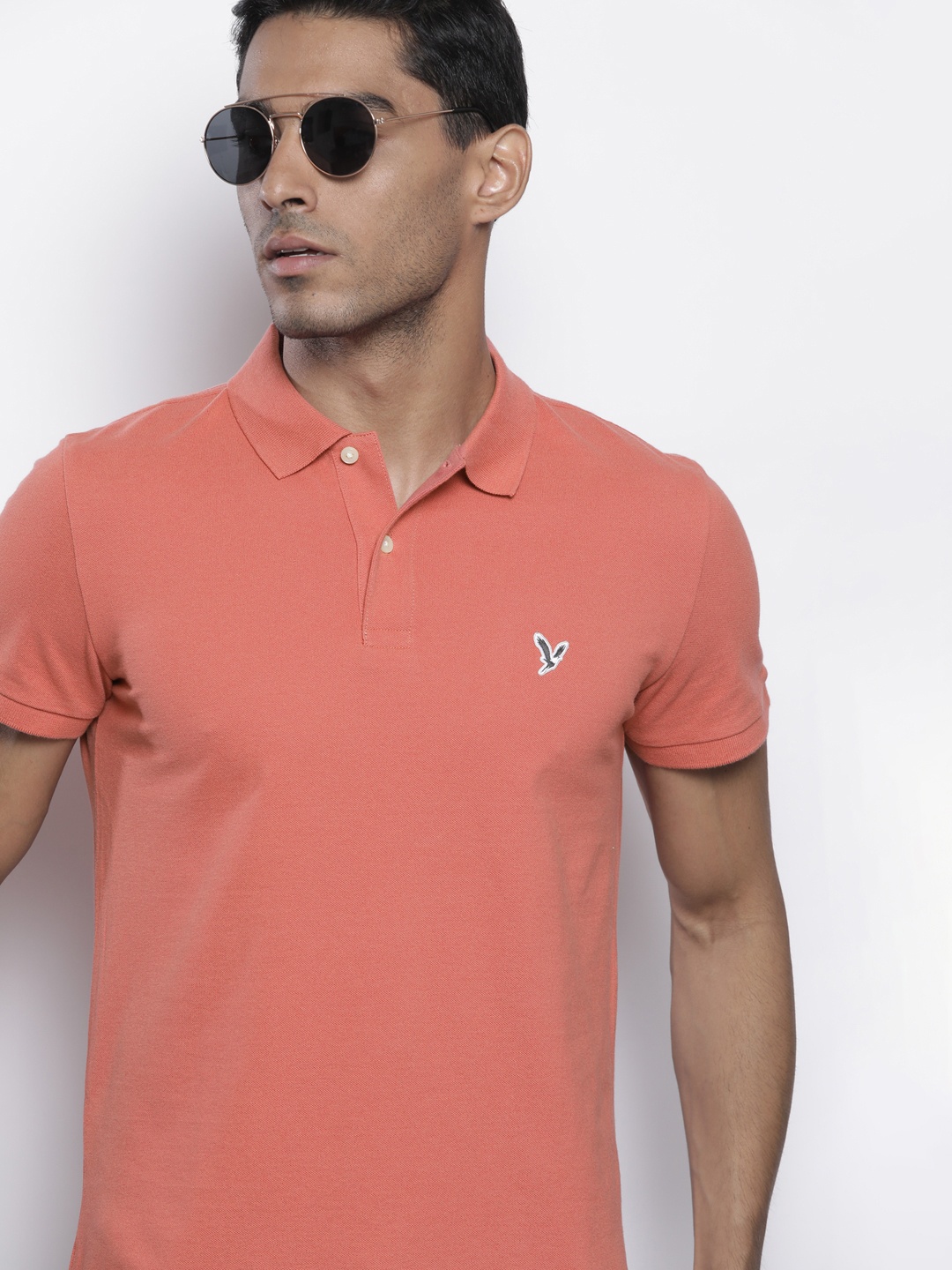 

AMERICAN EAGLE OUTFITTERS Men Coral Pink Solid Polo Collar Slim Fit T-shirt