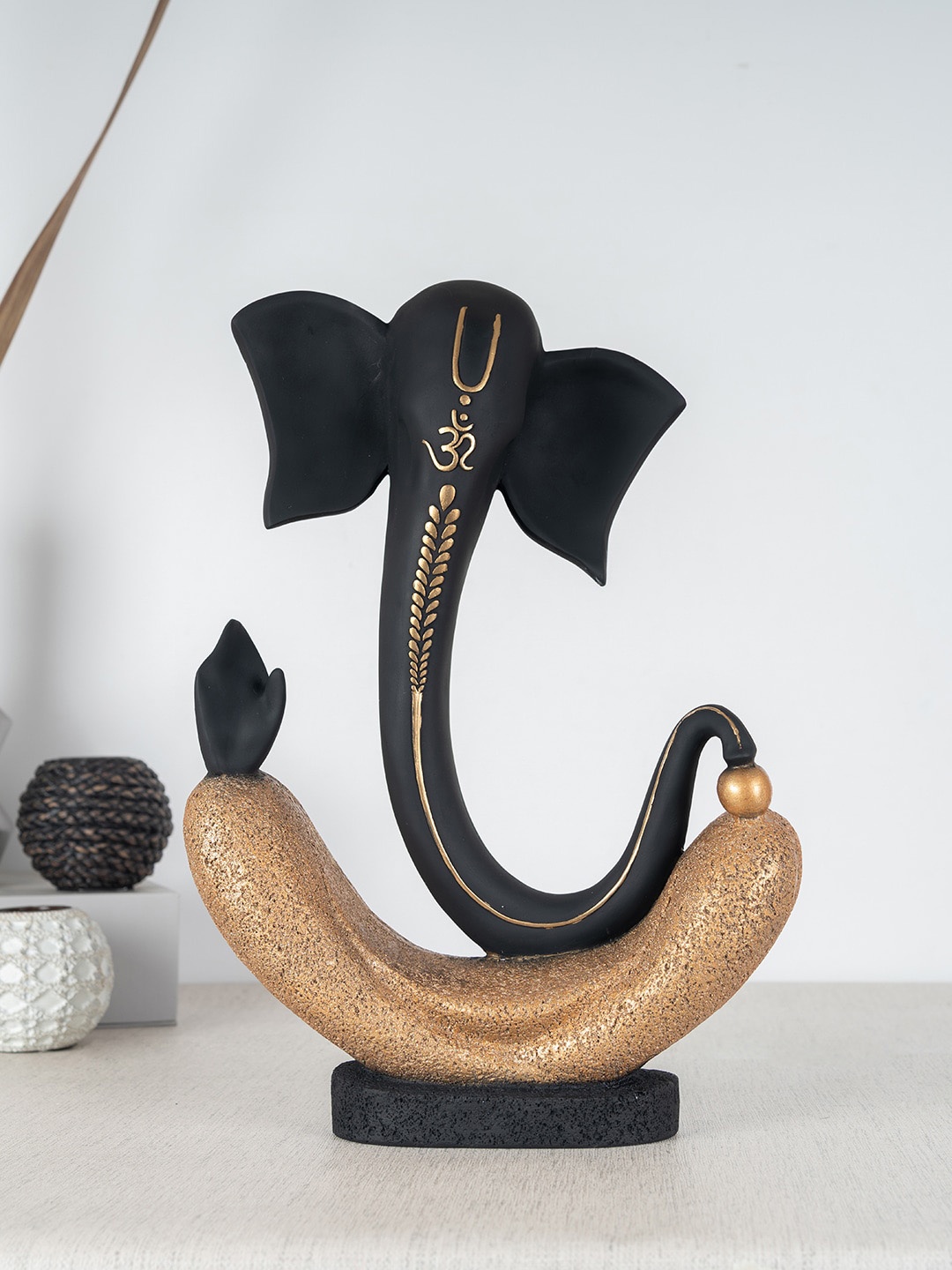 

HomeTown Black & Gold Polyresin Ganesha Showpieces