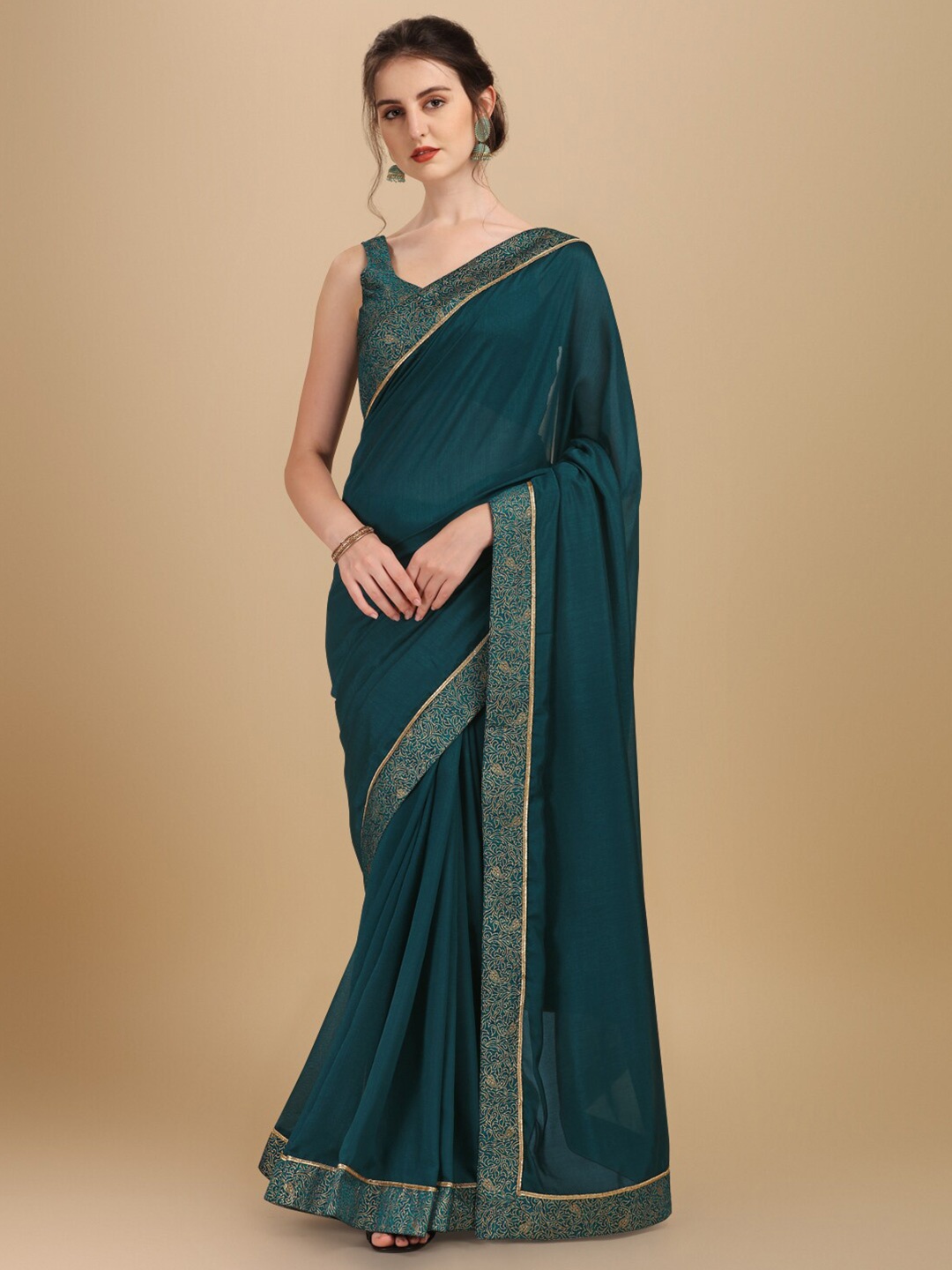 

Sangria Women Teal Woven Design Silk Blend Saree with Brocade Blouse Piece