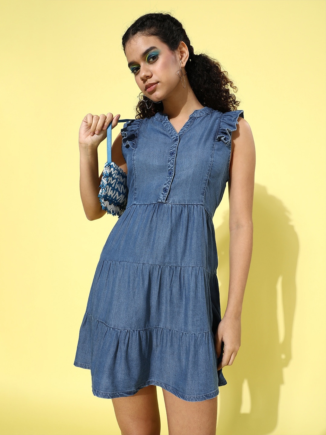 

The Roadster Lifestyle Co. Blue Solid Tiered Denim A-Line Dress with Ruffles