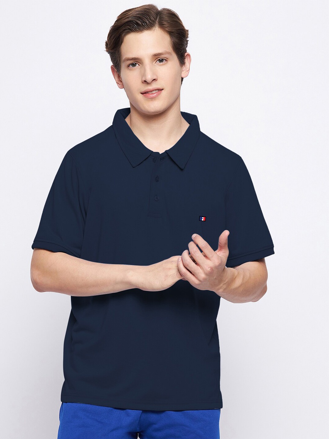 

FRENCH FLEXIOUS Men Navy Blue Solid Polo Collar Sports T-shirt