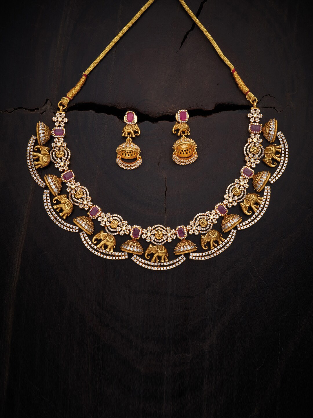 

Kushal's Fashion Jewellery Red Gold-Plated Antique Jewellery Set