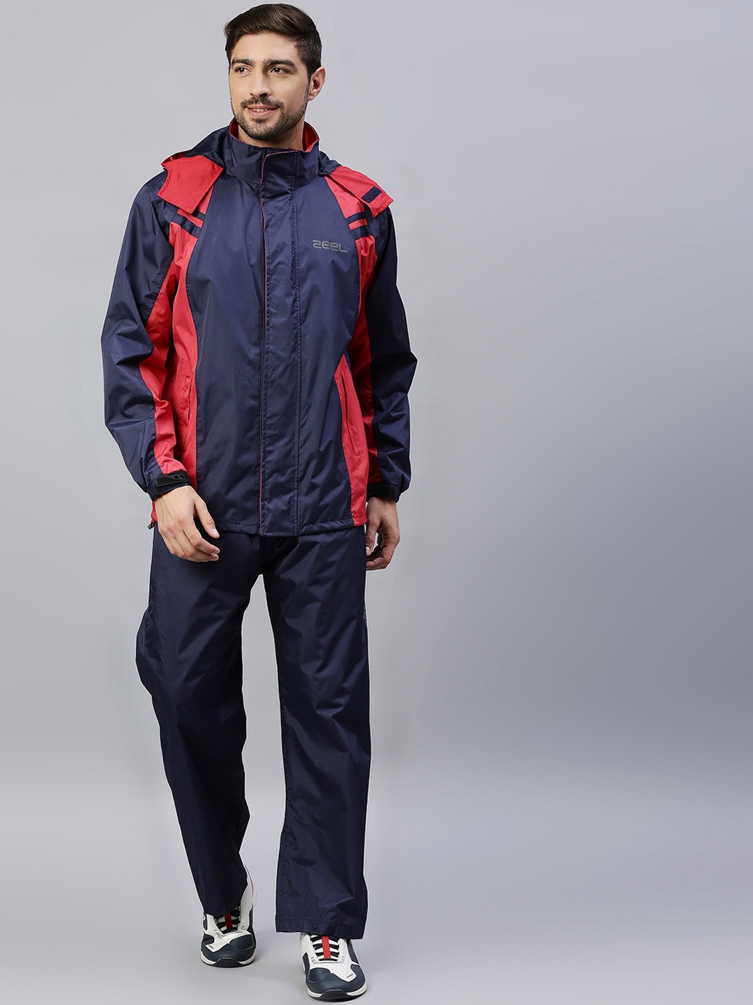 

Zeel Men Blue & Red Solid Bikers Rain Suit