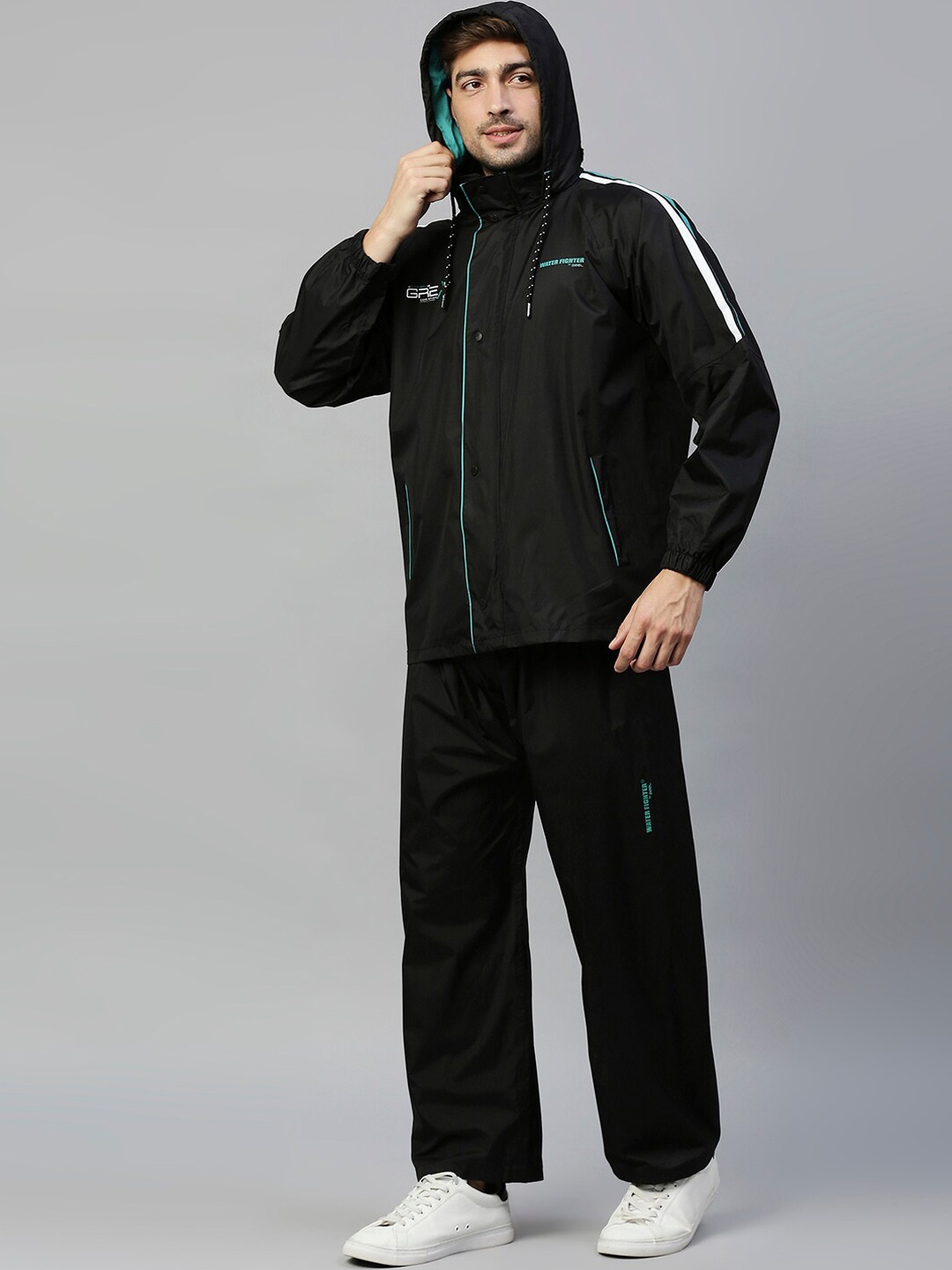 

Zeel Men Black & Green Solid Waterproof Rain Suit