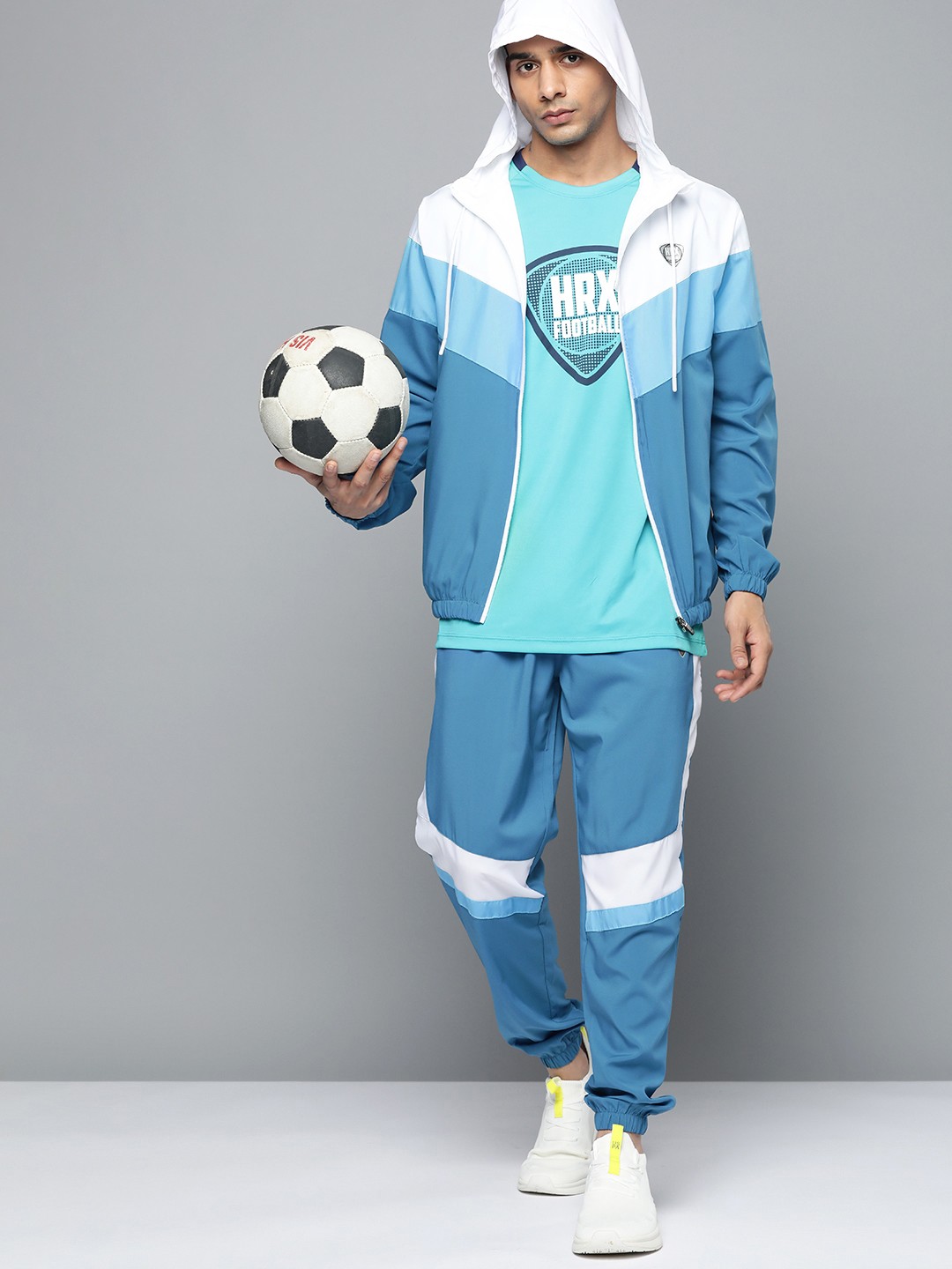

HRX by Hrithik Roshan Men Teal Blue & White Striped Regular Fit Football Tracksuit