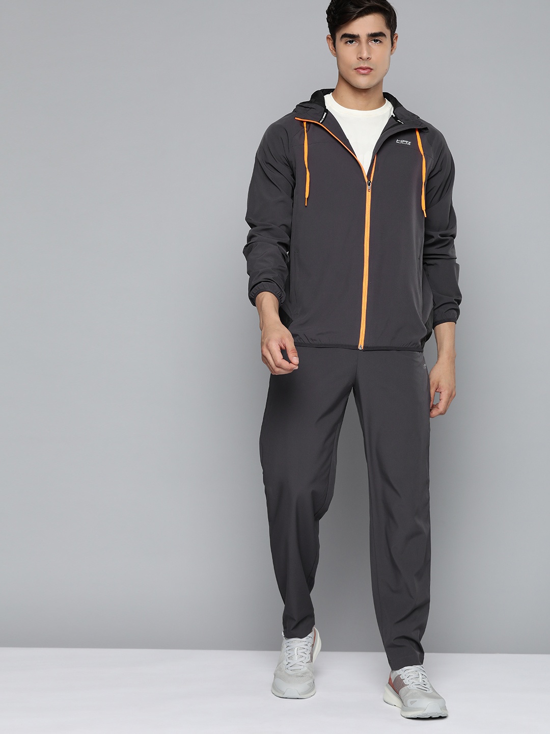 

HRX by Hrithik Roshan Men Charcoal Grey Solid Running Tracksuits