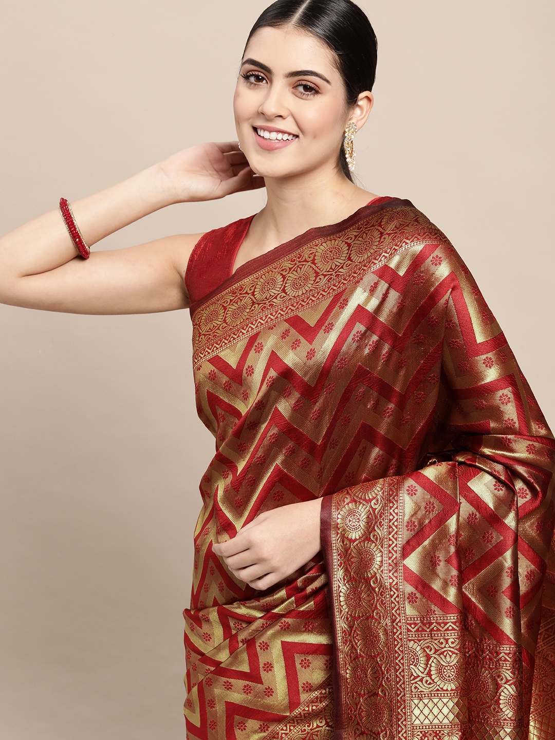 

Saree Swarg Maroon & Golden Silk Blend Banarasi Sarees