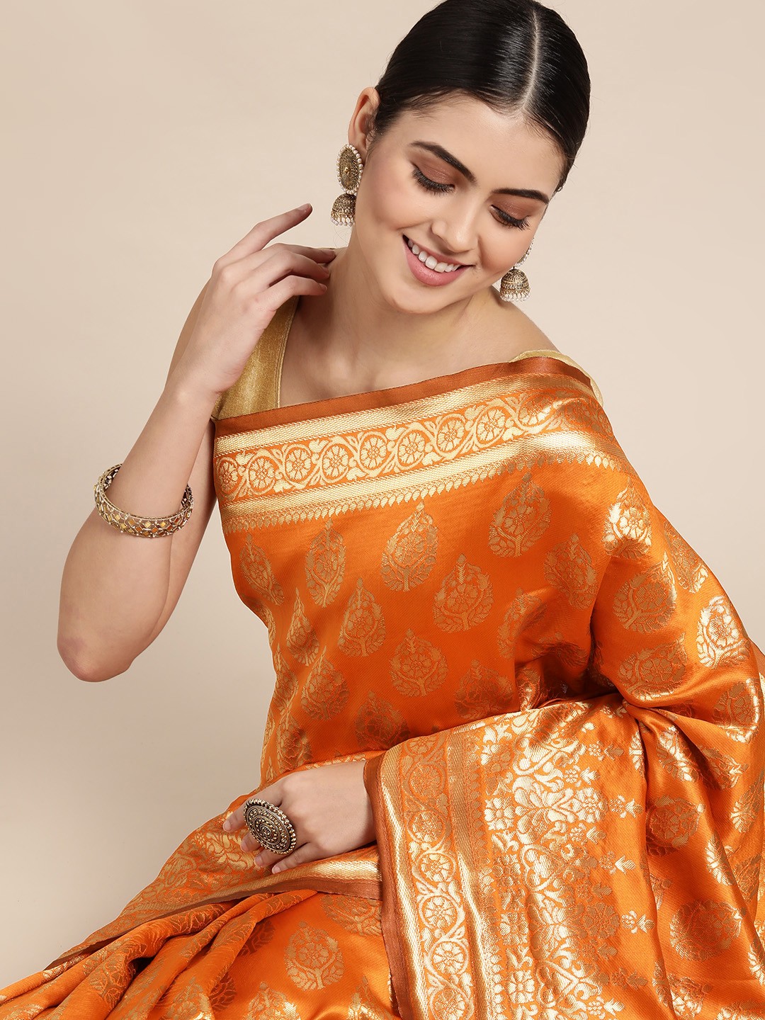

Saree Swarg Orange & Golden Ethnic Motifs Silk Blend Banarasi Sarees