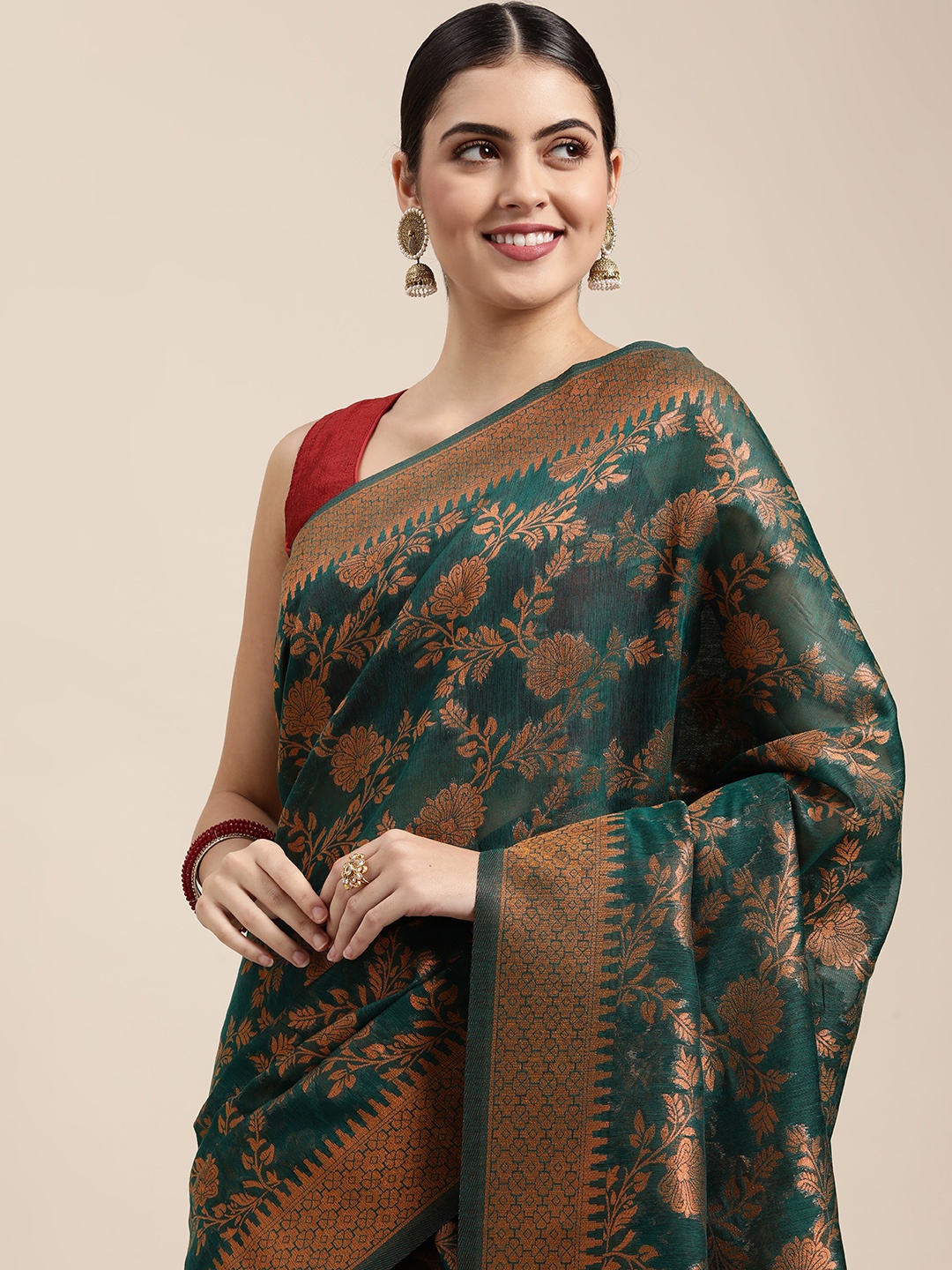 

Saree Swarg Green & Golden Ethnic Motifs Silk Blend Banarasi Sarees