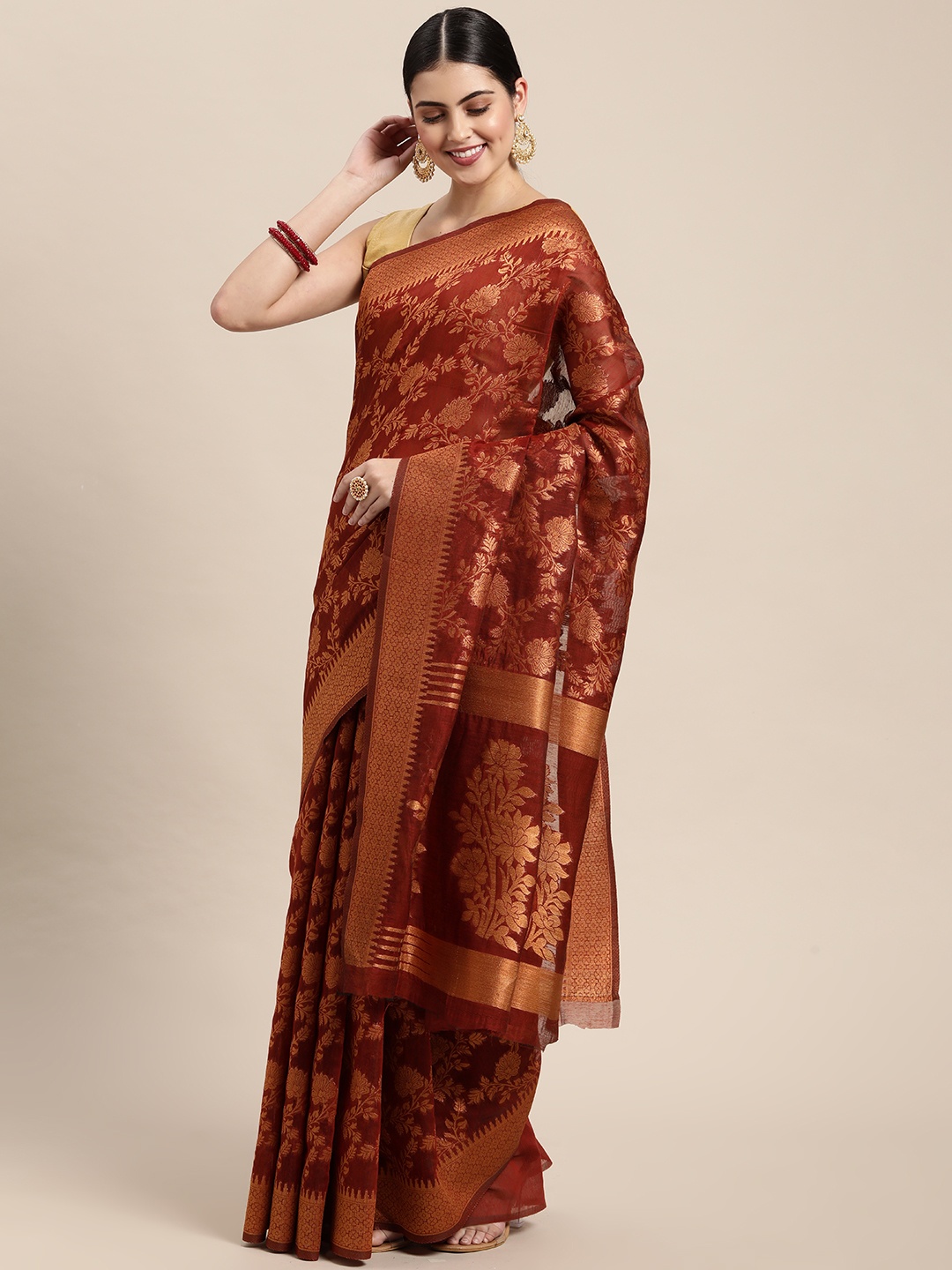 

Saree Swarg Maroon & Golden Ethnic Motifs Silk Blend Banarasi Sarees