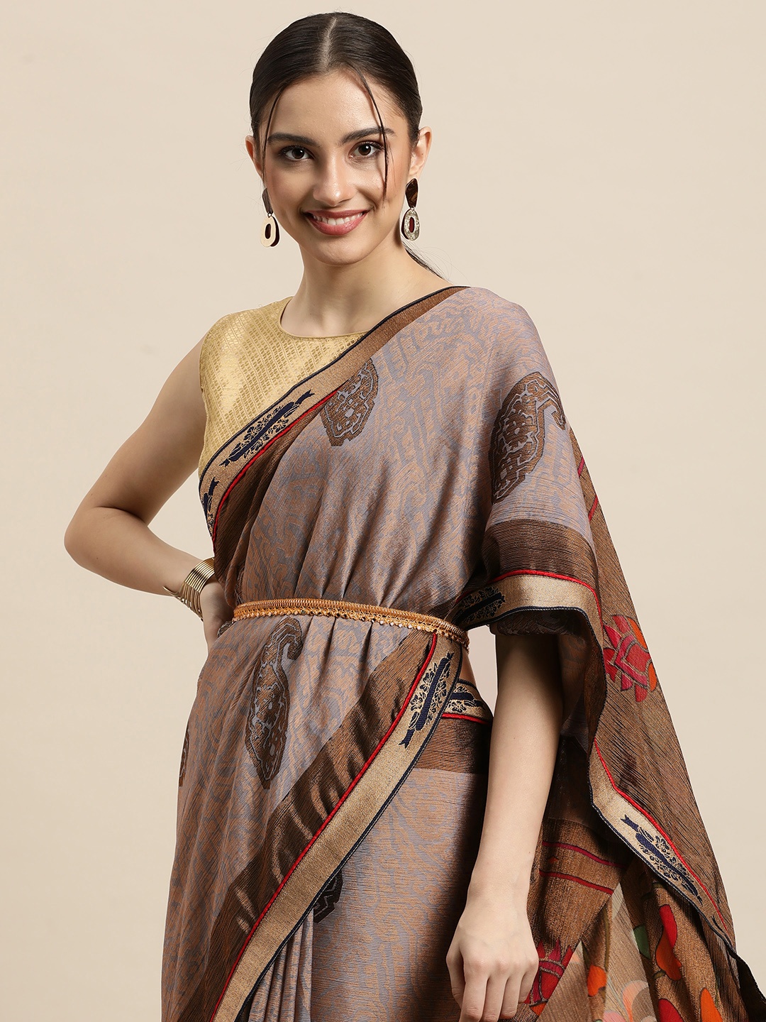 

Triveni Grey & Brown Ethnic Motifs Printed Brasso Saree
