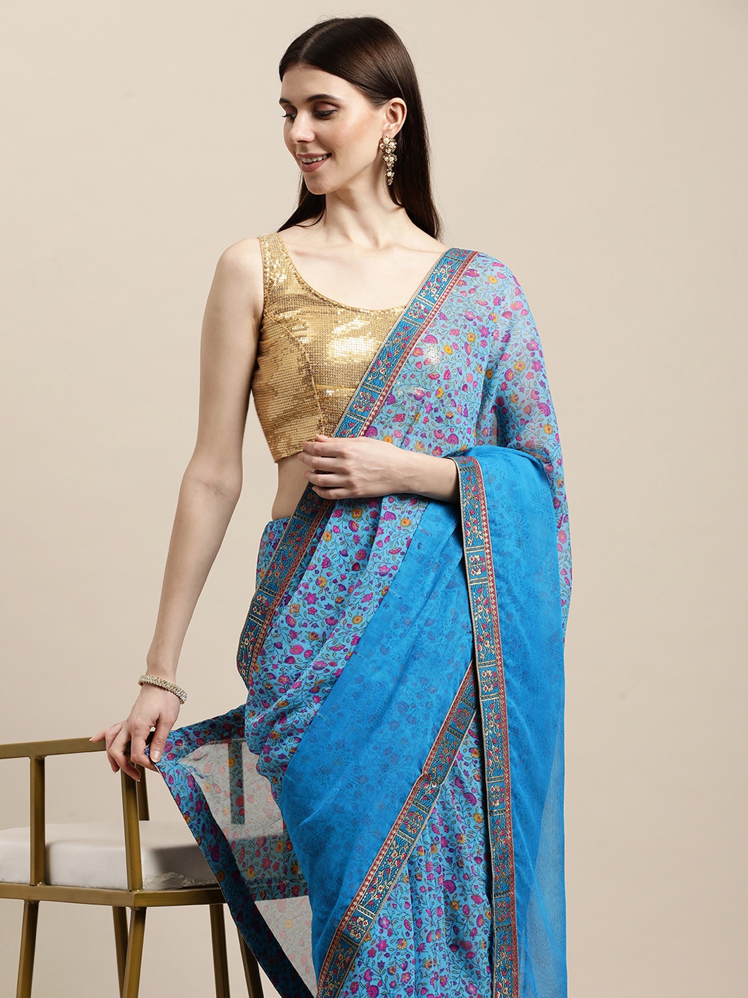 

Triveni Blue Floral Pure Chiffon Saree