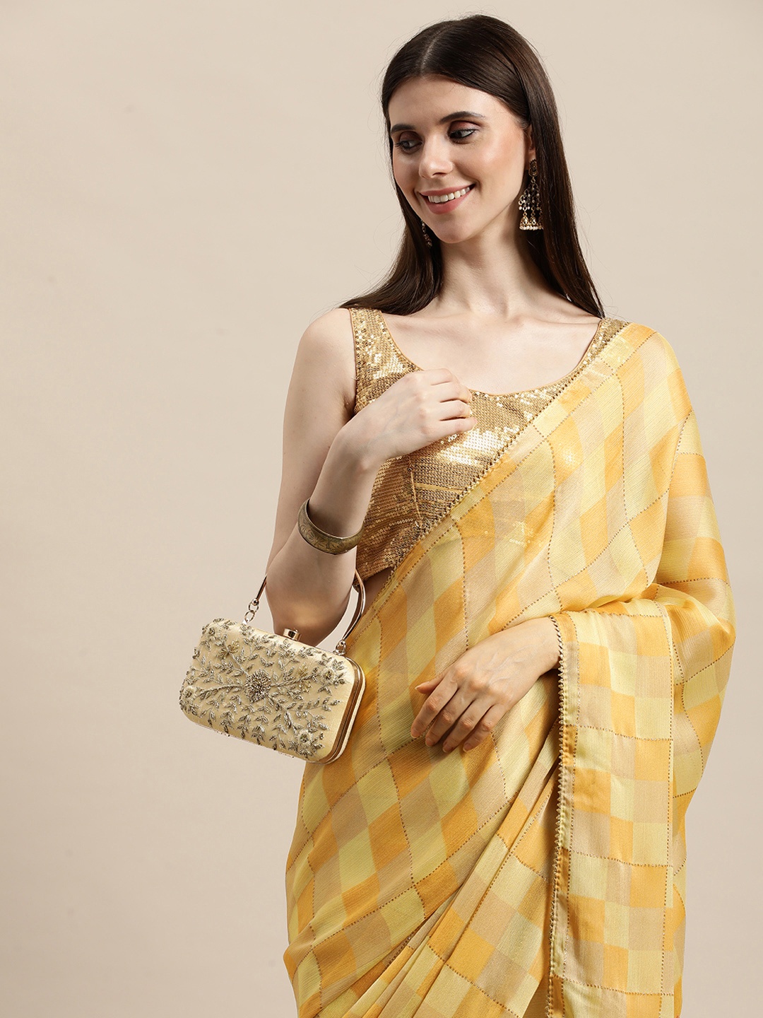 

Triveni Beige & Yellow Checked Print Saree