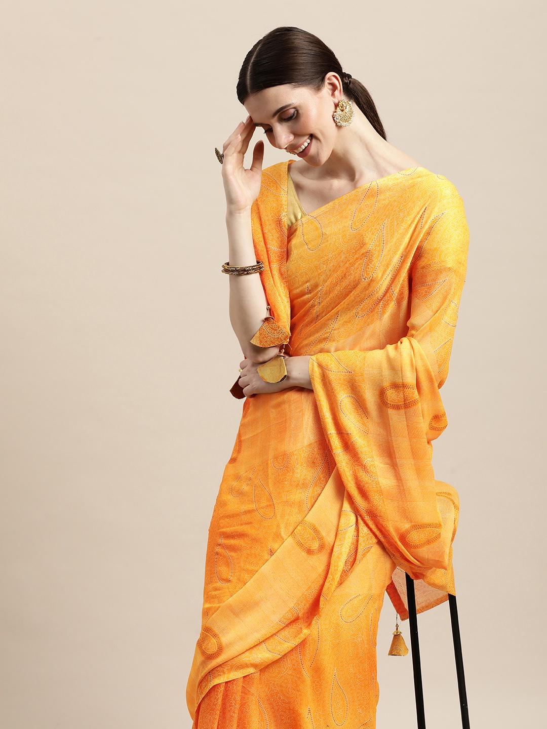 

Triveni Yellow Paisley Print Saree