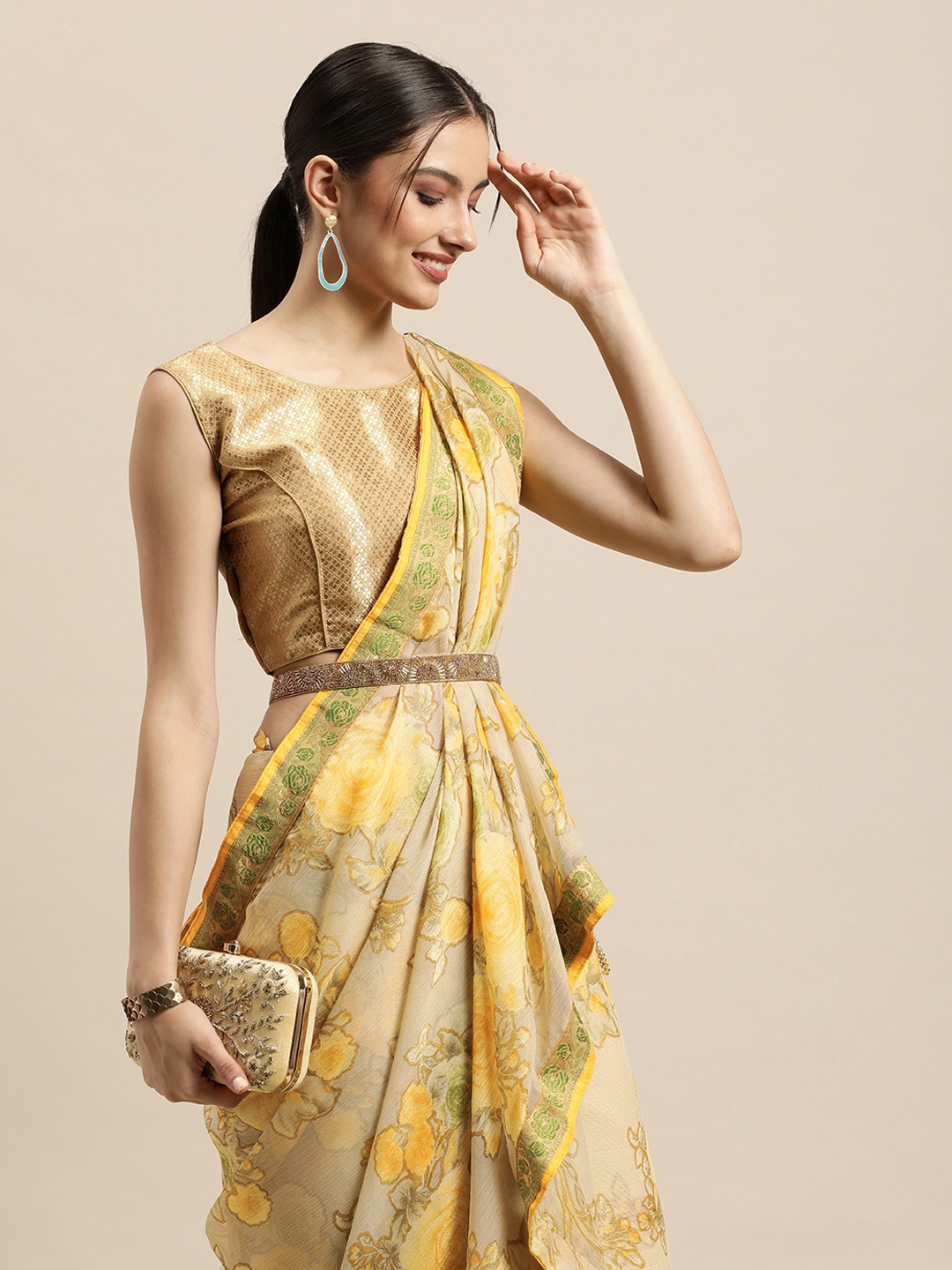 

Triveni Yellow & Green Floral Printed Brasso Saree