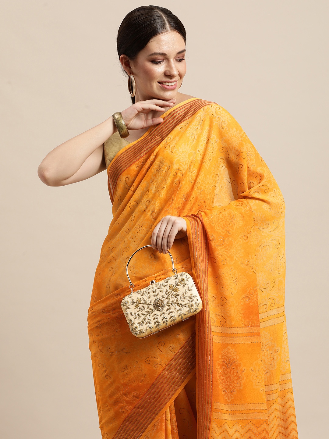 

Triveni Yellow Ethnic Motifs Printed Zari Pure Georgette Saree