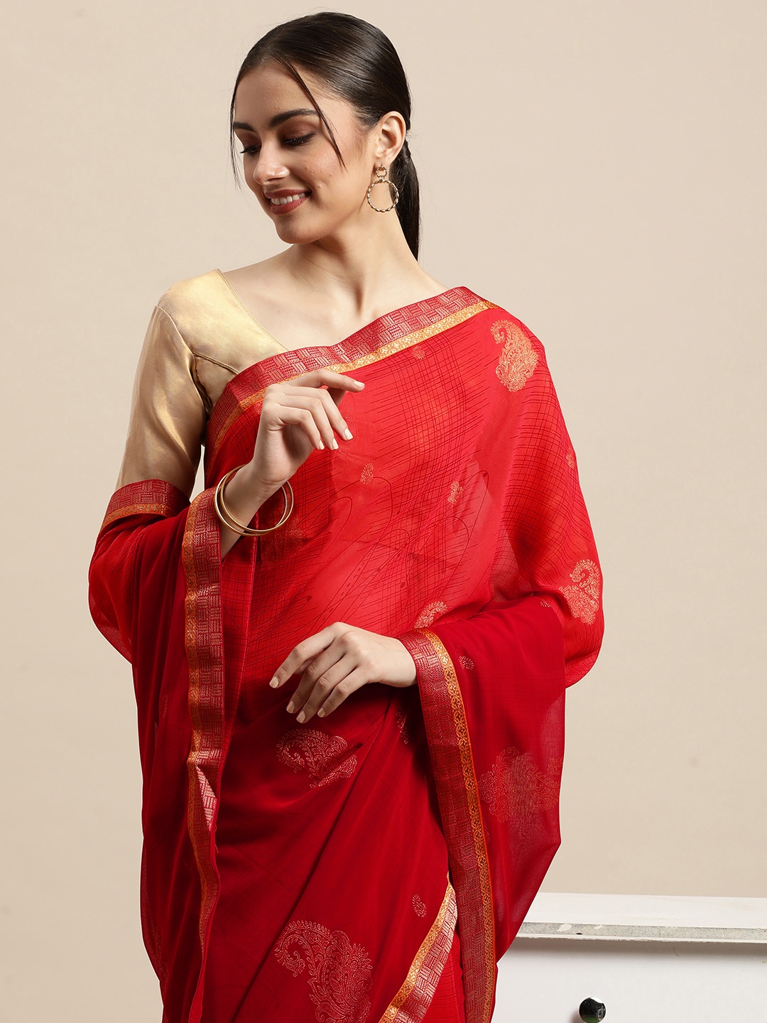 

Triveni Red Paisley Zari Pure Georgette Saree