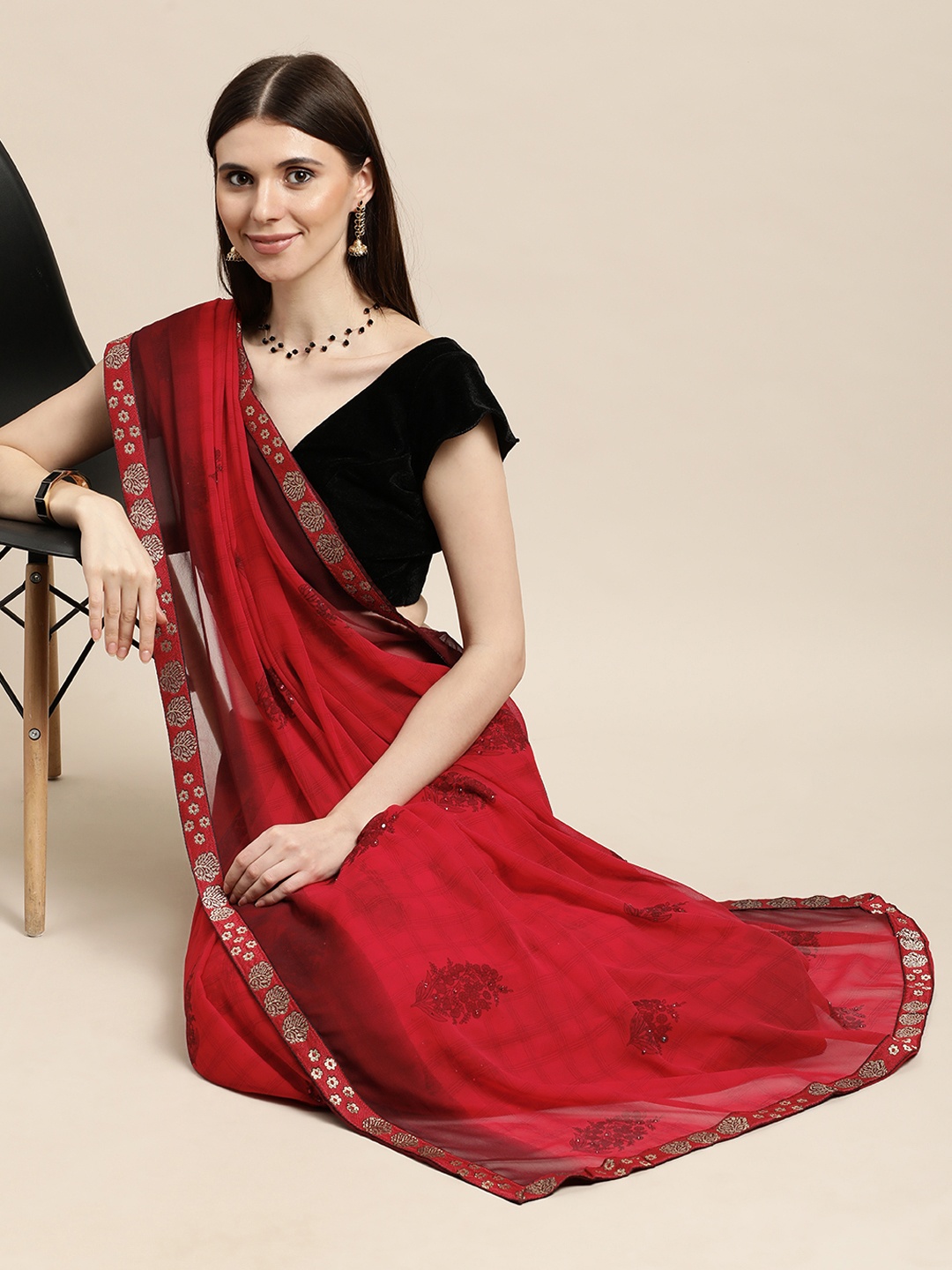 

Triveni Red Ethnic Motifs Pure Georgette Saree