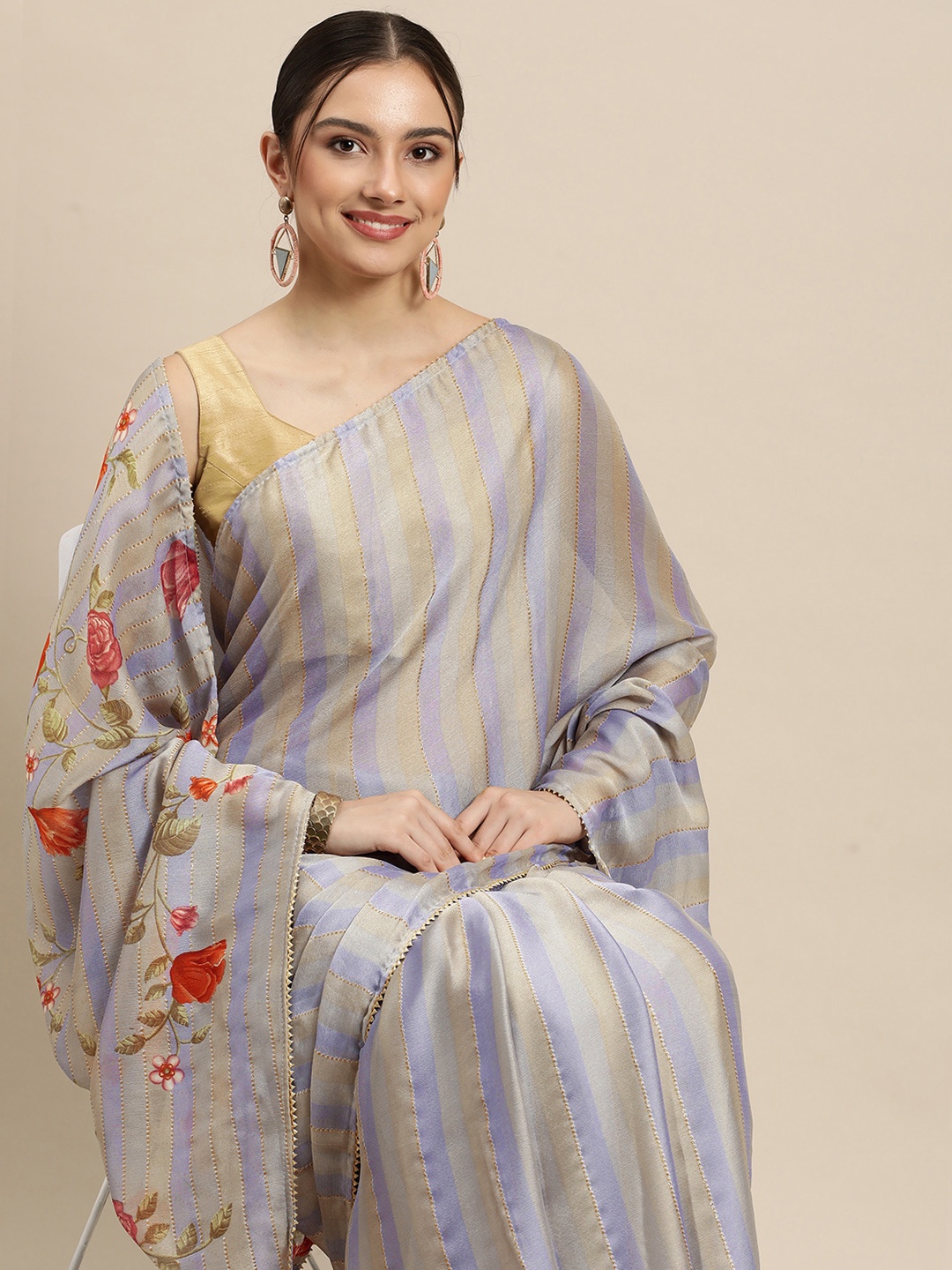 

Triveni Grey & Golden Striped Zari Leheriya Saree